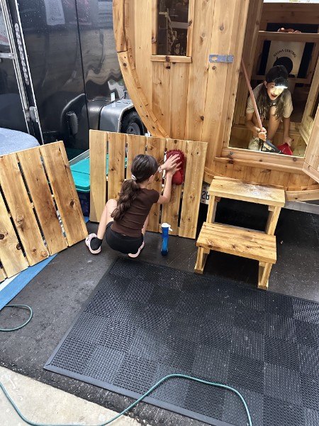 The sauna being cleaned and prepped before a rental